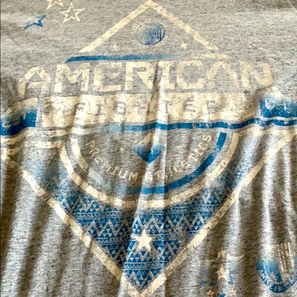 Grey and blue men’s American fighter xl